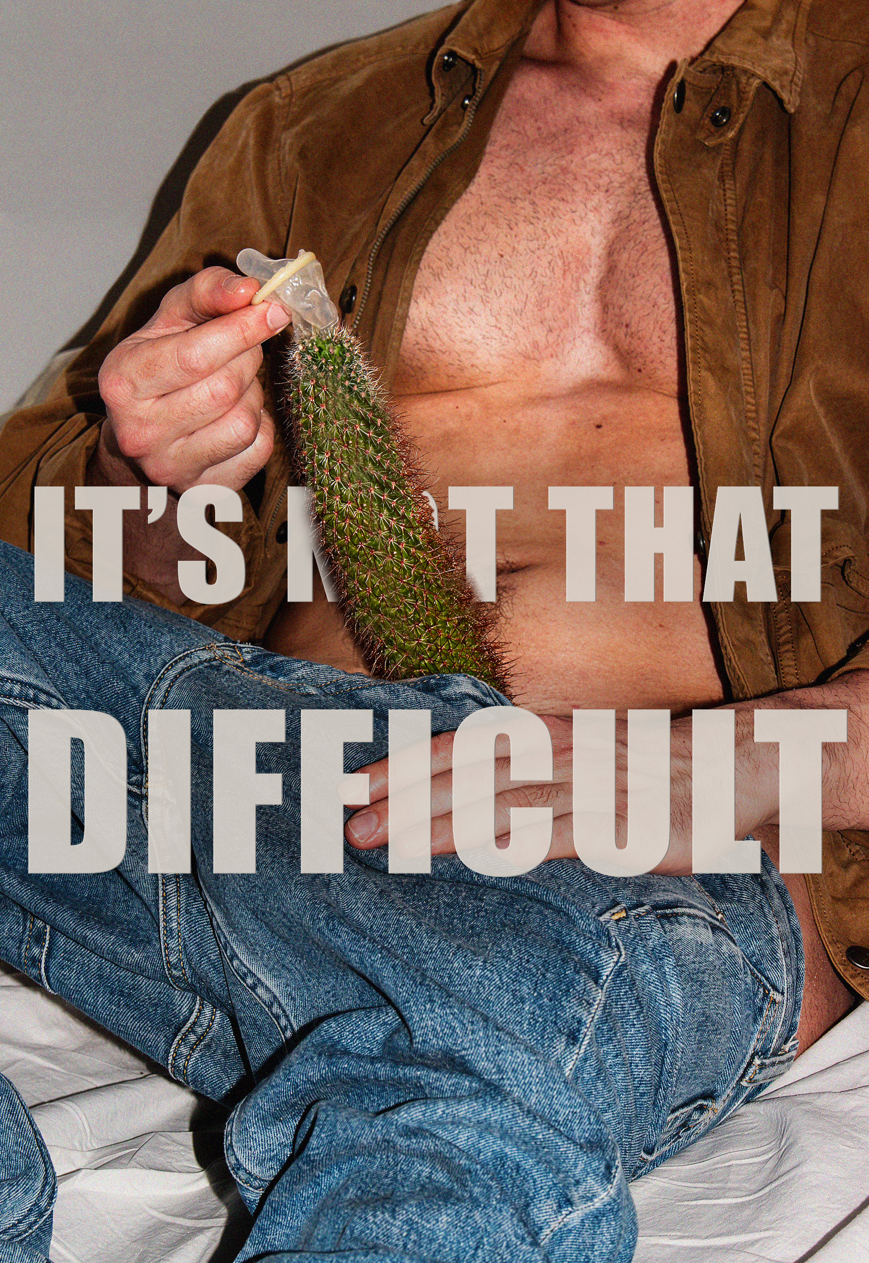 A person holding a cactus with a condom on it, text reads: It's not that difficult